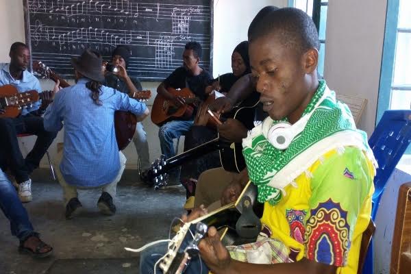 Trainees at a music workshop on guitar playing in Zanzibar