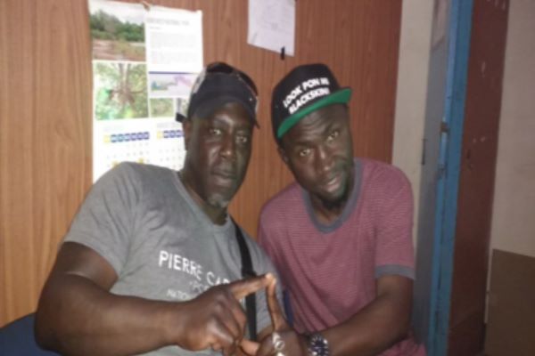 Grantie Asher, left, is on a tour of the Gambia.  Photo: The Voice Vibes