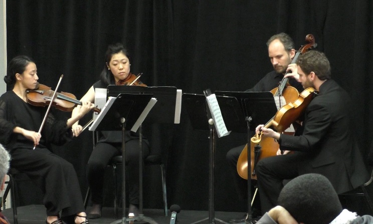 Crossing Borders Ensemble performing a score by Nigerian composer Godwin Sadoh in Chicago (August, 2017). Photo: Africlassical