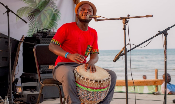 Zimbabwean artist Slickartie performing at the 2018 edition of Lake of Stars in Malawi.